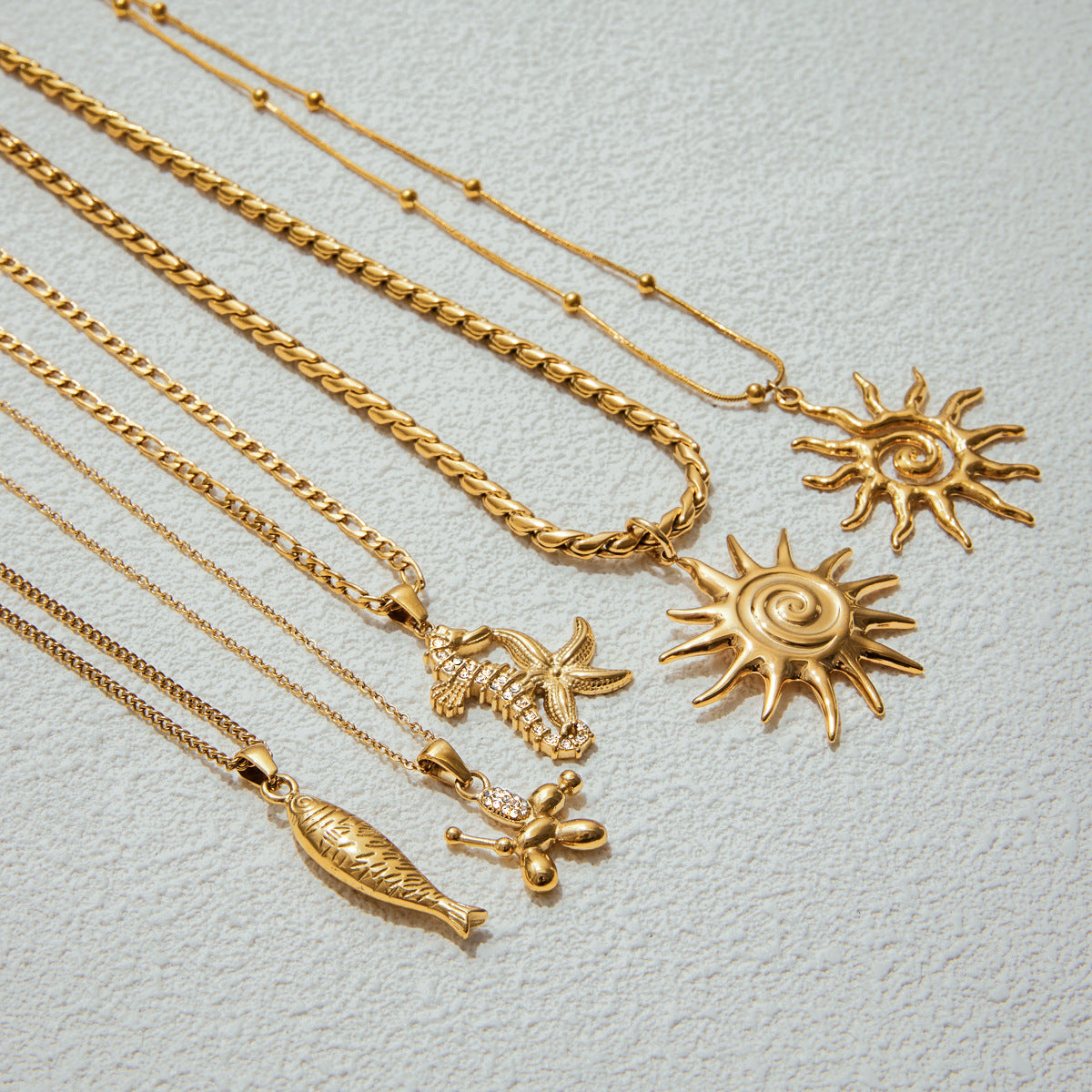 18k Gold Tone Ocean-Themed Jewelry Set - Seahorse/Starfish/Sun Pendants | INS-Style Necklace/Bracelet/Ring Daily/Brunch Accessories for Women 2. Google SEO Title